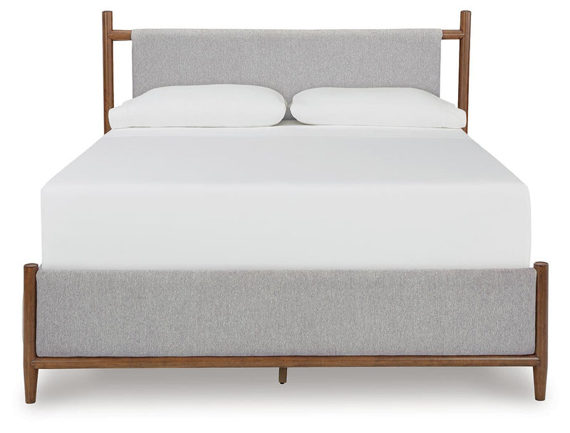 Lyncott Queen Upholstered Bed with Mirrored Dresser