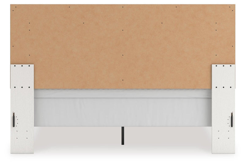 Zuraleus King Upholstered Panel Bed, Dresser, Mirror, Chest and Nightstand