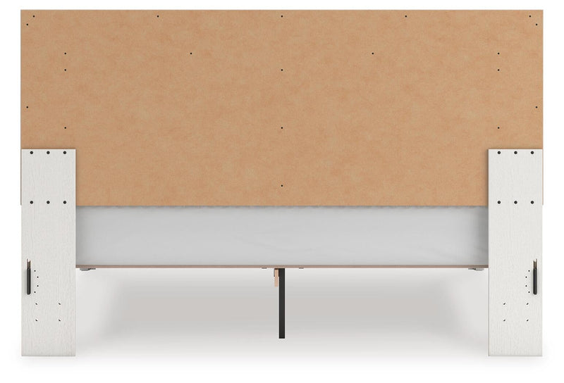 Zuraleus King Upholstered Panel Platform Bed, Dresser, Mirror and Nightstand