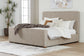 Dakmore California King Upholstered Bed with Mirrored Dresser and Chest